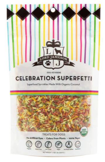 A colorful package of Lord Jameson Celebration Superfetti Organic Dog Sprinkles, a soy & gluten-free vegan dog treat made with organic coconut for dogs and natural colors, offering nutritional benefits.