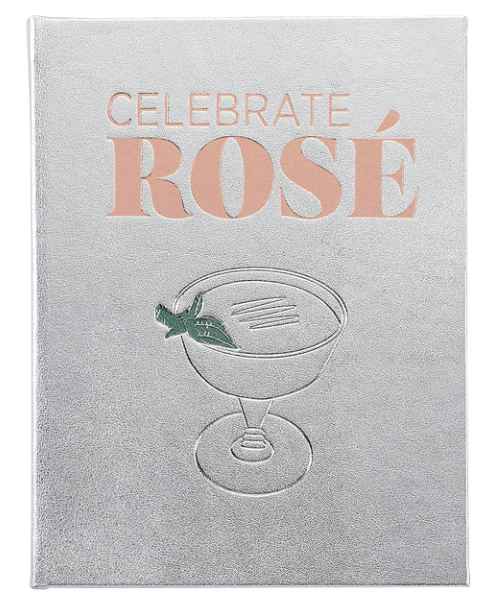 Graphic Image's "Celebrate Rose" book cover features a silver design with an embossed cocktail glass and pink text, embellished with a green leaf detail for rosé cocktail inspiration.