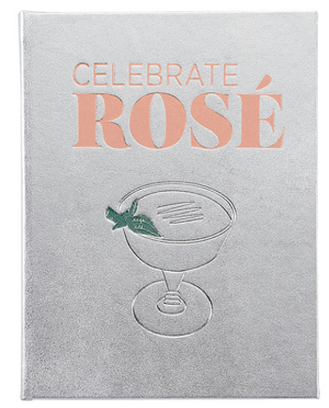 Graphic Image's "Celebrate Rose" book cover features a silver design with an embossed cocktail glass and pink text, embellished with a green leaf detail for rosé cocktail inspiration.
