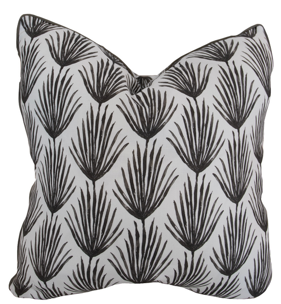 A Palm Parade Graphite Pillow from Associated Design with a custom black and white botanical leaf pattern.