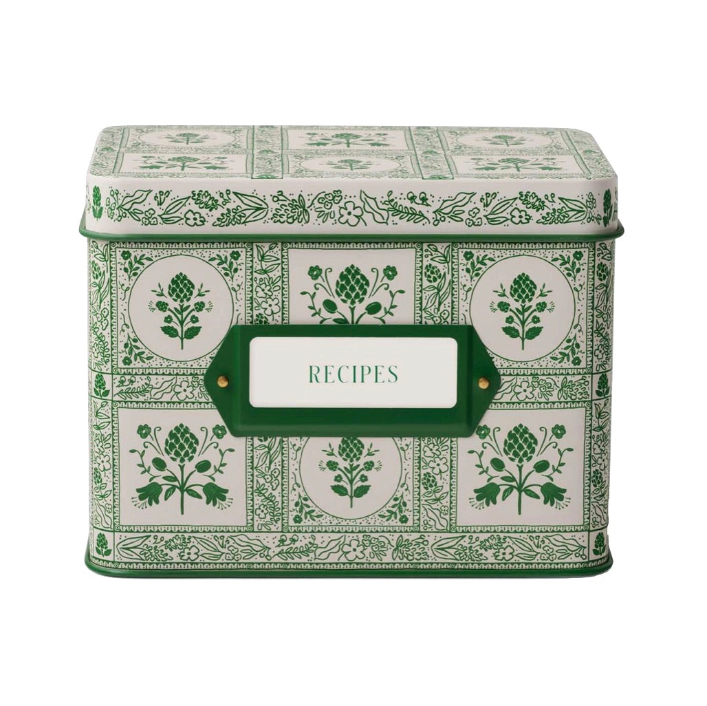 The Rifle Paper Co. Artichoke Recipe Tin is a decorative green and white metal tin with floral patterns and a "RECIPES" label—perfect for charming kitchen organization.