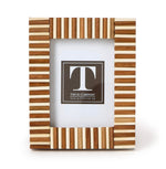 The Stacks Mini Frame Collection by Two's Company features a rectangular photo frame handcrafted from quality mango wood with alternating light and dark wood strips, and comes with a placeholder image pre-inserted.