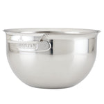 The Hestan Provisions 7qt Stainless Steel Mixing Bowl features a large capacity, reflective finish, sturdy handle, embossed branding, and is dishwasher safe for easy cleanup. Set against a plain white background.