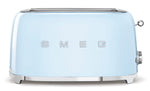 The Smeg 4-Slice Toaster Collection in light blue features chrome accents, two slots, a lever, and a control knob, displayed on a white background.