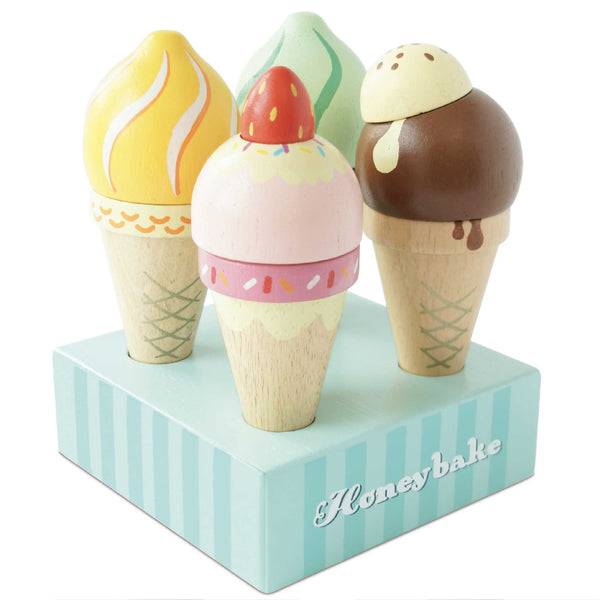 A set of three Le Toy Van Ice Cream Sets in a stand, each with different colors and designs, intended for pretend play foods.