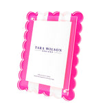 The Tara Wilson Scallop Stripe Frame by Tara Wilson Designs features pink and white stripes with a scalloped edge, making it a best-selling statement piece for any space.