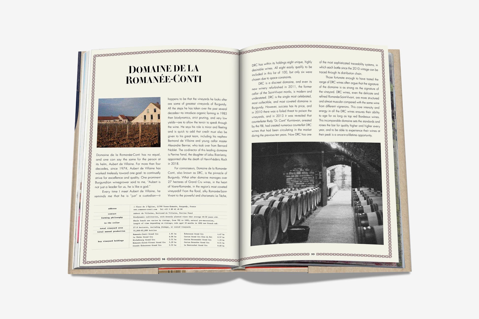 An open book, "The 100 Burgundy: Exceptional Wines To Build A Dream Cellar" by Assouline, displays Domaine de la Romanée-Conti text with a small building photo on the left and a black-and-white wine cellar photo on the right.