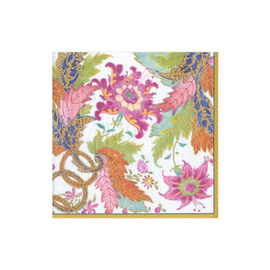 The Caspari Tobacco Leaf Ivory Collection features eco-friendly, decorative square napkins with a colorful floral and leaf pattern in pink, purple, green, and gold. Made from triple-ply material for softness and durability.
