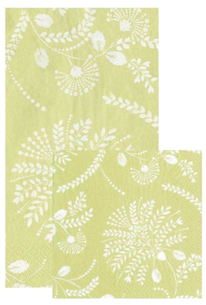 Two Trailing Floral Pale Green napkins by Caspari, featuring a white botanical leaf and fern design, with one napkin partially overlapping the other.