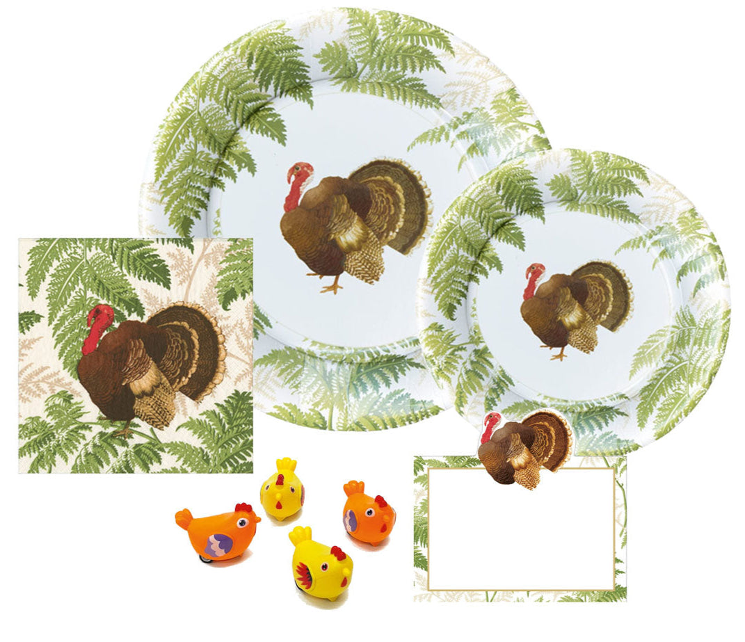 The Caspari Turkey Among Ferns Partyware Collection features two plates, a napkin with fern and turkey designs, a blank place card, and four toy chickens—perfect for autumn parties or Thanksgiving celebrations.