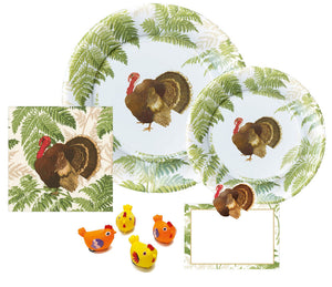 The Caspari Turkey Among Ferns Partyware Collection features two plates, a napkin with fern and turkey designs, a blank place card, and four toy chickens—perfect for autumn parties or Thanksgiving celebrations.