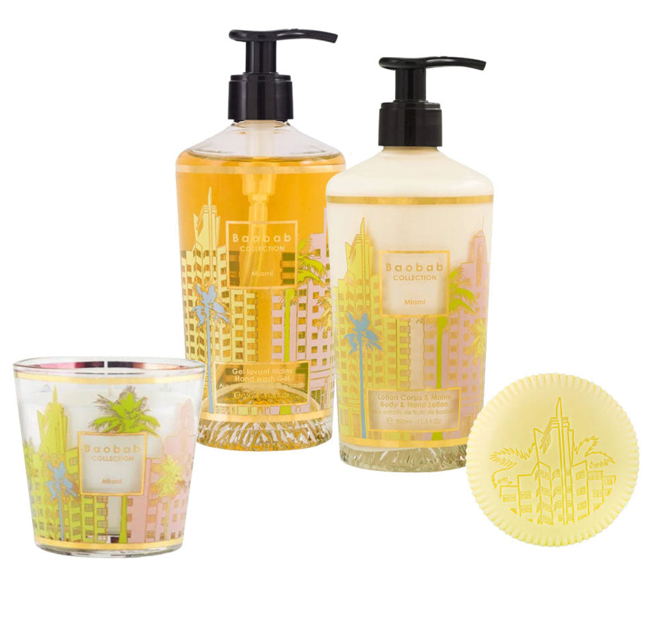 The Baobab Collection Miami Body Wellness Collection by Baobab includes a candle, liquid soap, lotion with pumps, and yellow soap bar, all decorated with a colorful cityscape and infused with a fresh summer-like Miami scent.