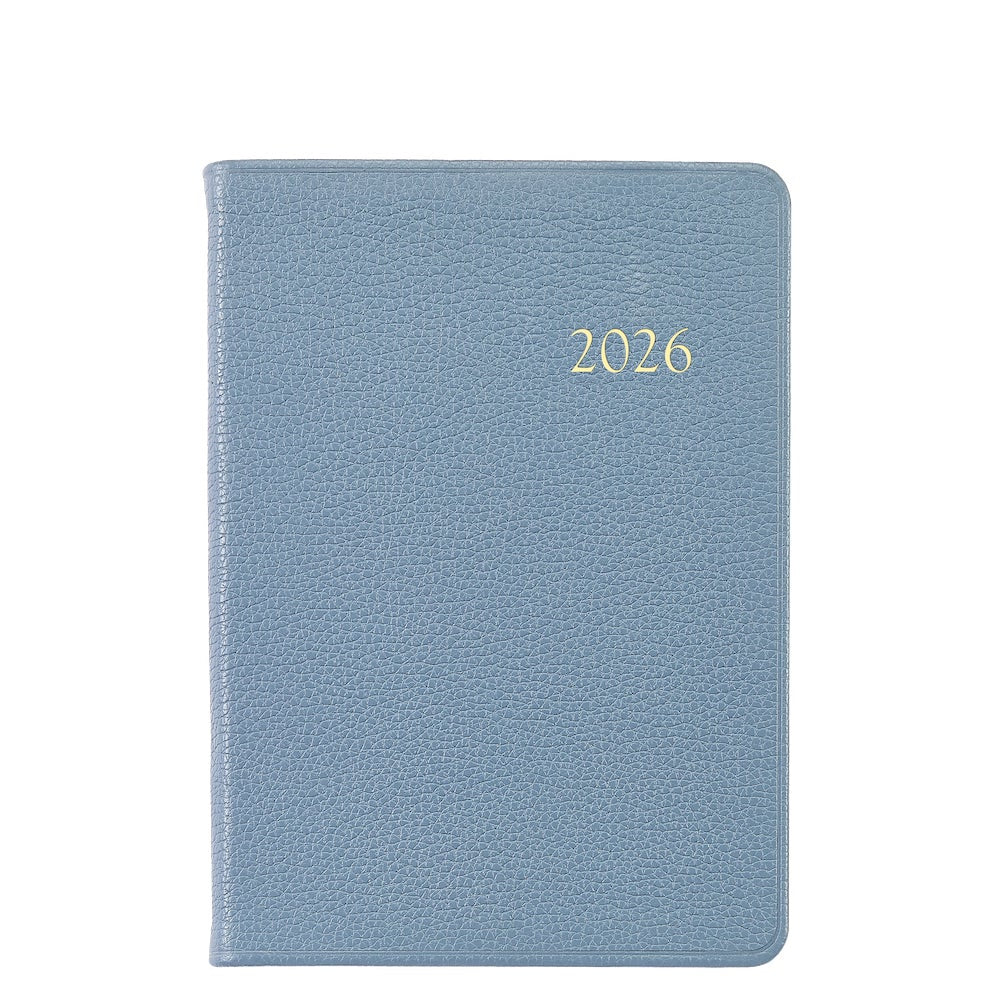 The Graphic Image 2026 Weekly Journal Planner Collection features a light blue leather cover with "2026" embossed in gold and includes convenient appointment pages to keep you organized.