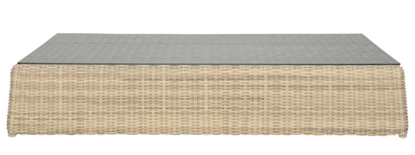 The Zeya Grande Outdoor Coffee Table by Janus et Cie features a weather-resistant woven rattan base and flat glass top, perfect for outdoor entertaining, shown against a plain white background.