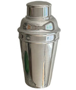 The Hôtel Silver Vintage Cocktail Shaker with Built-in Citrus Juicer stands upright against a plain background—an essential reflective silver bar accessory for any home mixologist.