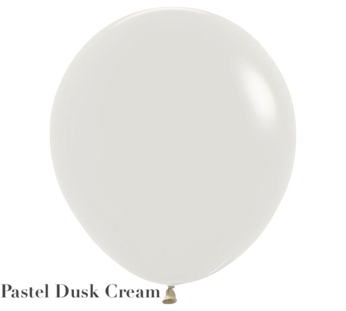 A single Solid Balloon from Burton+Burton in a soft pastel dusk cream color stands out against a white background, capturing the essence of a delicate live floral arrangement. The text "Pastel Dusk Cream" is displayed in the bottom left corner of the image, evoking thoughts of elegant local delivery options for any occasion.