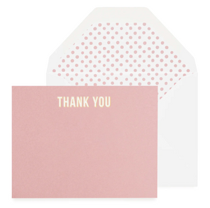 The Rose "Thank You" Card Set by Sugar Paper features a pink letterpress card with white text, displayed in front of a white envelope lined with a pink polka dot pattern.