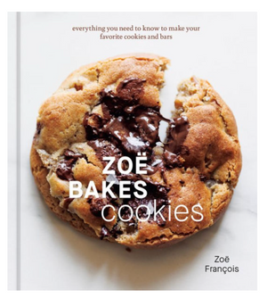 Cover of Zoe Bakes Cookies by Penguin Random House, featuring a large chocolate chip cookie on a white background—an inviting choice for every home baker seeking delicious cookie recipes.