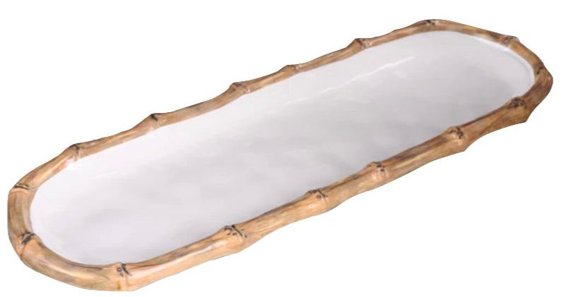 The Beatriz Ball Vida Natural Bamboo Serveware Collection features an oval serving tray with a white surface and bamboo-inspired rim, crafted from luxury melamine for break resistance.