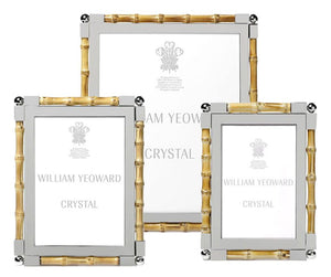 The Bamboo Classic Frame Collection by William Yeoward Crystal features elegant frames with silver, nickel-plated borders and bamboo-style trim—perfect for adding timeless style to your home décor.