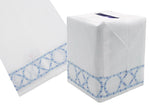 Part of the Bamboozle Bath Collection by Haute Home, this tissue box cover features hand embroidery with blue geometric patterns on Italian linen and comes with a matching folded cloth.
