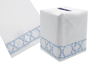 Part of the Bamboozle Bath Collection by Haute Home, this tissue box cover features hand embroidery with blue geometric patterns on Italian linen and comes with a matching folded cloth.