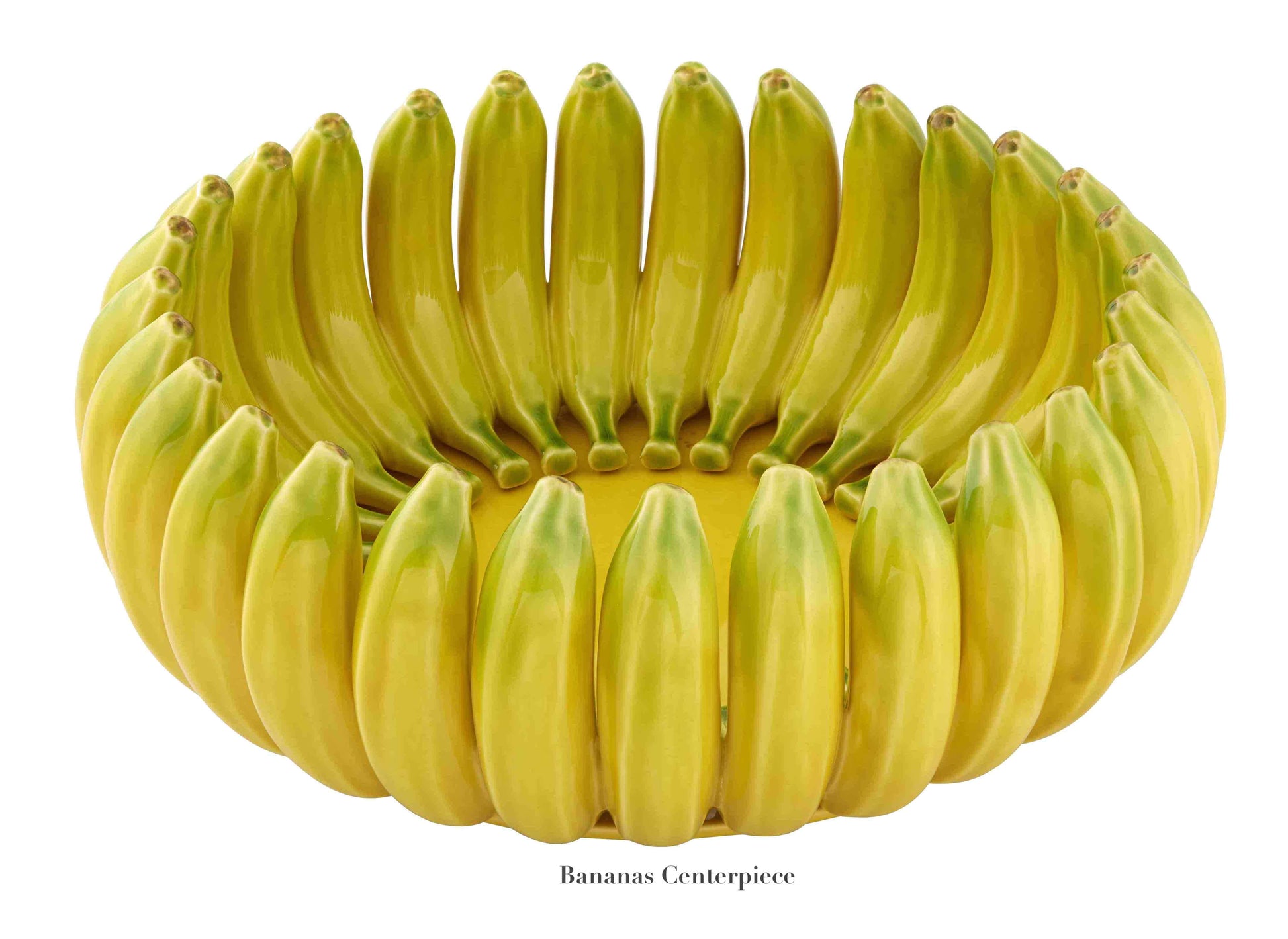 From the Bordallo Pinheiro Bananas From Madeira Serveware Collection, this ceramic bowl is handcrafted to mimic connected yellow bananas in an elegant circular arrangement.