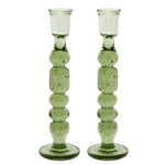 The Provence Candlestick Set by Juliska features two mouth-blown glass candlesticks with vibrant colors, a textured bubbly surface, and rounded stacked shapes, displayed upright side by side.