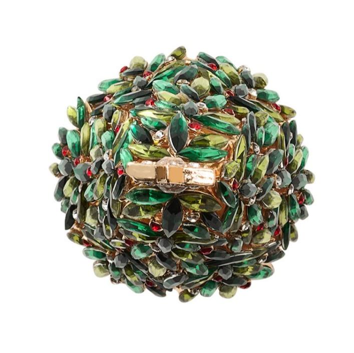 The Kim Seybert Christmas Tree Napkin Ring Set features a round design with clustered green, yellow, and red stones—resembling a jeweled holiday tree—adding festive charm to your table décor.
