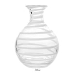 The Bella Bianca Carafe Collection by William Yeoward Crystal features a clear glass carafe with a round base, narrow neck, diagonal white stripes, and 50-oz capacity—perfect for wine. Proposition 65: may expose you to chemicals causing harm in California.