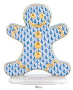 The Gingerbread Man Collection by Herend features a porcelain figurine with the brand’s signature blue fishnet pattern, gold accents, and a white base—a charming piece for any art lover.
