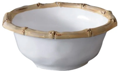 A white luxury melamine bowl with a bamboo-style rim, from Beatriz Ball's break-resistant Vida Natural Bamboo Serveware Collection.