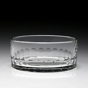 The Bridget Bottle Stand by William Yeoward Crystal features clear glass with a thick base and embossed, rounded patterns—classic bar style—set on a gradient background. California residents: Proposition 65 warning may apply.