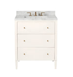 The Conrad Vanity Collection by Made Goods features a white floating bathroom vanity with three soft-close drawers, brass hardware, marble countertop, and brass faucet, shown against a plain white background.