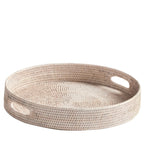 The Burma Whitewash Rattan Round Ottoman Tray Collection by Napa Home & Garden features a round tray with raised sides and oval cut-out handles, ideal for home decor, shown on a white background.