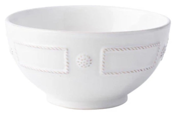 The Berry & Thread French Panel Dinnerware Collection by Juliska features a white ceramic bowl with delicate embossed rectangular and circular motifs, inspired by Parisian architecture, shown against a plain background.