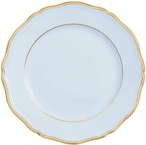 A white porcelain plate from the Raynaud Mazurka Or Fond Bleu Gris Dinnerware Collection, featuring a scalloped edge and a gold rim.