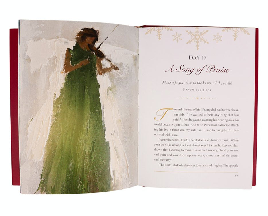 An open book from Anne Neilson's "Christmas Angels: Devotions and Art of Hope and Joy for the Advent Season" shows a woman in a green dress playing violin on one page, and text titled "Day 17: A Song of Praise" on the other.