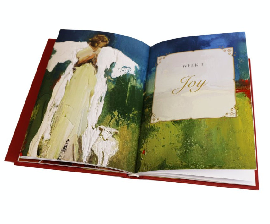 An open book from Anne Neilson’s "Christmas Angels: Devotions and Art of Hope and Joy for the Advent Season" shows an abstract painting of a woman with a white animal and a page titled "Week 3 Joy" in elegant script.