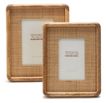 The Two's Company Cane Frame Collection showcases two handcrafted frames with a charming woven pattern made from sustainable mango wood. These frames come in slightly different sizes, creating a harmonious display for your cherished photos.