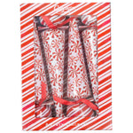 A box of eight Caspari Peppermint Crackers with red and white swirl designs and red ribbons, displayed in striped packaging with a clear window—festive surprises ideal for your next celebration.