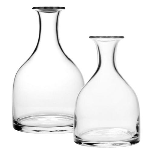 Two clear, wide-bottomed glass carafes from the Classic Carafe Collection by William Yeoward Crystal are displayed side by side on a white background.