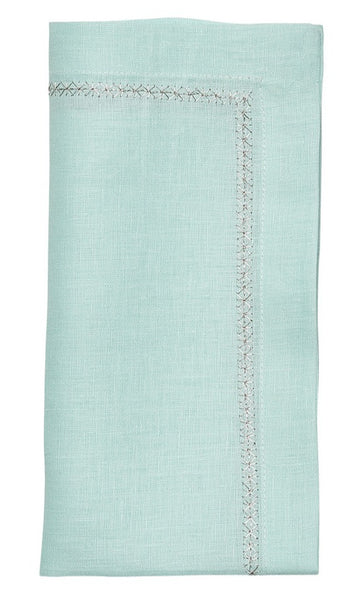 Light blue folded Kim Seybert Classic Napkin, Set of 4 with decorative stitching along one edge.