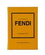 Yellow hardcover "Little Book of Fendi" by Laia Farran Graves, an unofficial guide to the fashion brand’s impact, published by Graphic Image.