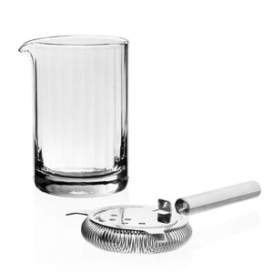 The William Yeoward Crystal Corinne Mixer and Strainer Set features a handmade crystal mixing beaker and professional-grade coiled strainer on a white background—ideal for elevating your home bar.