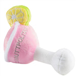 The Haute Diggity Dog Cosmuttpolitan Plush Toy is a pink cocktail glass plush with a white stem, yellow slice garnish, hidden squeaker, and "Cosmuttpolitan" embroidered on the side.