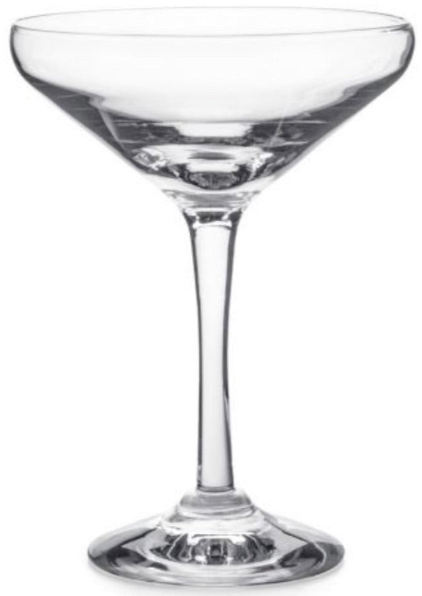 The Vintner Drinkware Collection coupe glass by Simon Pearce features a wide bowl, short stem, and flat base in handblown glass, displayed empty against a plain white background.