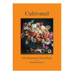 The cover of "Cultivated: The Elements of Floral Style" by Chronicle Books displays a vivid floral arrangement in a vase set against a dark background, emphasizing elegant floral design.