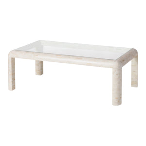 The Harley Natural Bone Coffee Table by Made Goods features a rectangular glass top and rounded, light-colored bone legs and frame.