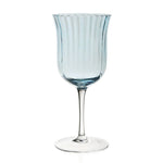 The Corinne Blue Collection Water Goblet by William Yeoward Crystal features a fluted, light blue bowl with a slim stem and round base, bringing elegant charm to your table setting.